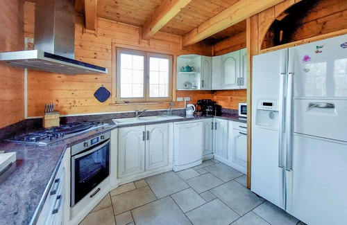 Anould House | Experience an Authentic Wooden Chalet with Hot Tub Bliss