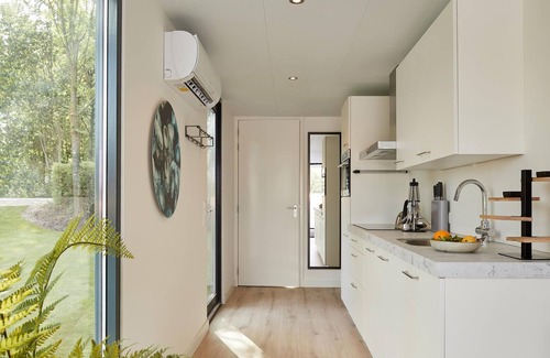 Maasbree House | Looking for a relaxing getaway close to the water? Then this vacation home located directly on a lak
