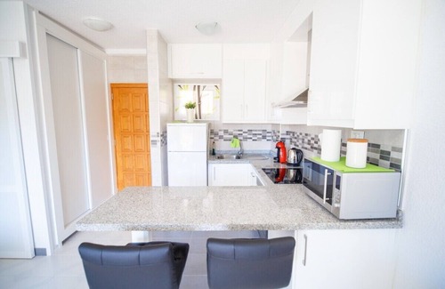 Los Cristianos Apartment | Unmatched Comfort in Los Angeles with Free WiFi & Pool