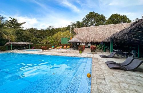 Puerto Triunfo Hotel | Experience Los Colores Ecoparque: Oceanfront Relaxation Awaits