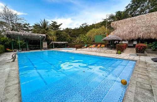 Puerto Triunfo Hotel | Experience Los Colores Ecoparque: Oceanfront Relaxation Awaits