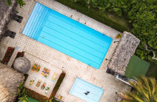 Puerto Triunfo Hotel | Experience Los Colores Ecoparque: Oceanfront Relaxation Awaits