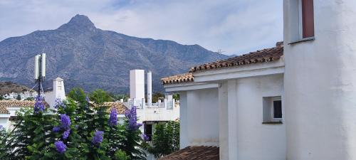 Marbella Apartment | Stylish Los Naranjos de Marbella Duplex with Pool Access