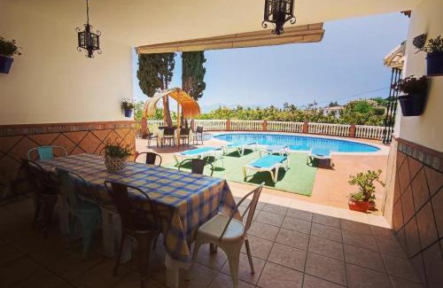 Alcaucin Cabin | Los Naranjos: Oceanfront Oasis with Pool & Pet-Friendly Perks