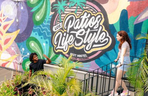 El Poblado Hostel | Los Patios Hostel: Relax by the Pool and Enjoy Family Fun