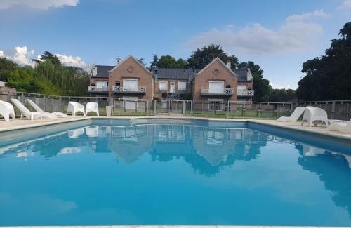Sierra de la Ventana Apartment | Discover Los Robles Apart Hotel: Poolside Retreat Awaits