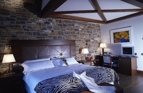 Ainsa Hotel | Discover Los Siete Reyes: Guest Rated 9.5 with Family Amenities