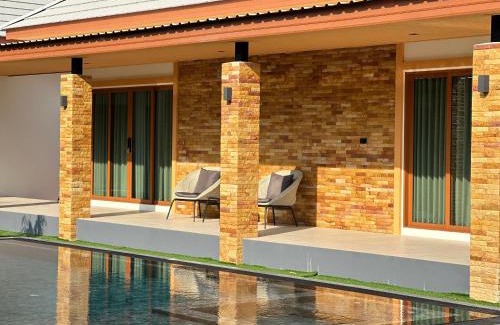 Buriram House | Relax at Lotus Lake View: Family-Friendly with Pool Access