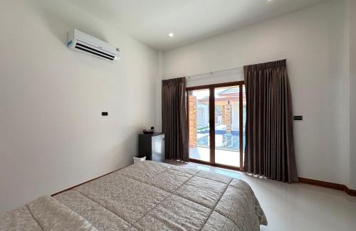 Buriram House | Relax at Lotus Lake View: Family-Friendly with Pool Access