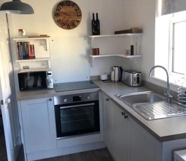 Loughor Apartment | Discover Loughor Annex: Rated 9.7/10 in Llangennech