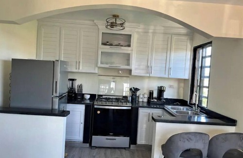 Cambita El Pueblecito Apartment | Cozy 2-Bedroom Retreat in San Cristobal, Family-Friendly