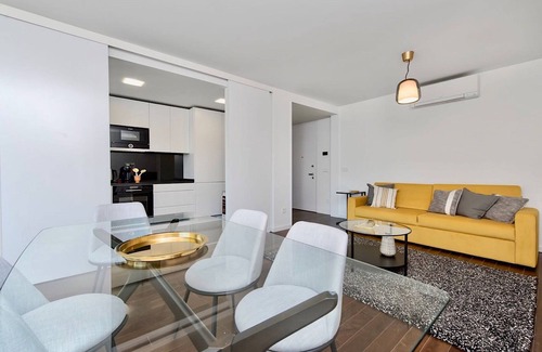 Sao Domingos de Benfica Apartment | Modern Lovage Yellow Apartment with AC and Wifi Access