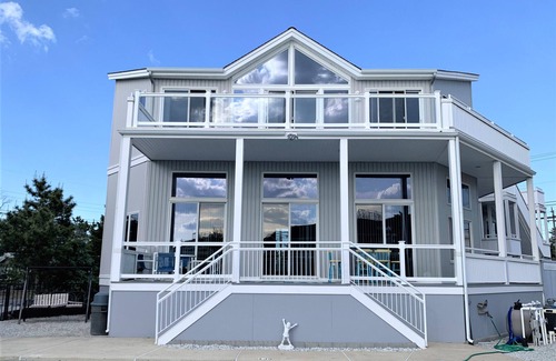 Beach Haven House | Elegant Loveladies Lagoon Front Home with Pool & Hot Tub
