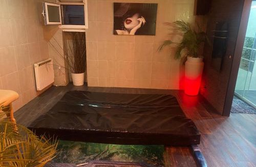 Republique - Tolstoi Apartment | Relaxation Awaits at Lovelove23spas with Hot Tub Access