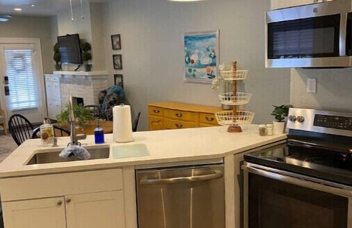 Dixieland Condo | Ideal 1 Bedroom Condo with Private Driveway and Child-Friendly Amenities