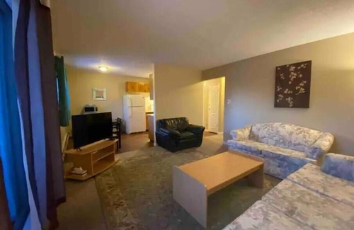 Grande Prairie Apartment | Cozy 2 Bedroom Getaway with Free Parking and Breakfast