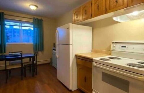 Grande Prairie Apartment | Cozy 2 Bedroom Getaway with Free Parking and Breakfast