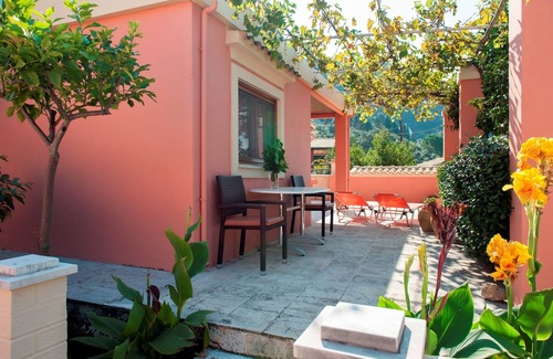 Agios Gordios Cottage | Charming 2-Bedroom Cottage Steps from the Beach with Pool