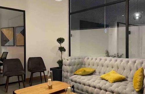 Zona 14 Apartment | Tranquil 2 Bedroom Loft with Pool & Pet-Friendly Perks