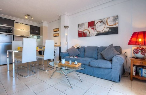 Arona Apartment | Prime 2-Bedroom Apartment Steps from the Beach, Rated 10/10