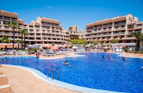 Arona Apartment | Prime 2-Bedroom Apartment Steps from the Beach, Rated 10/10