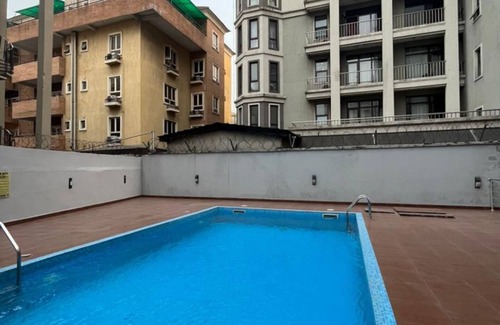 Igbobi Apartment | Inviting 3-Bedroom Retreat with Pool Near Four Point