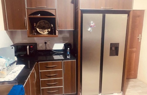 Lusaka House | Lovely 3-bedroom apartment in Lusaka with WiFi, AC