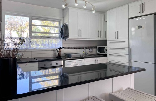 Plettenberg Bay Apartment | Inviting 4 Bedroom Condo Steps from the Beach