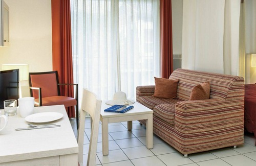 Divonne-les-Bains Apartment | Lovely apartment for 2 people with hot tub, WIFI, pool, A/C, TV, terrace, pets allowed and parking