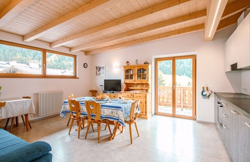 San Giovanni di Fassa Apartment | Inviting Apartment for 8 with Pet-Friendly Amenities