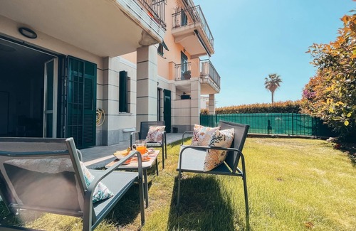 Imperia Apartment | Prime Apartment Steps from the Ocean with Pool & Views