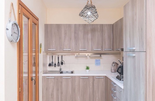 Porto Pozzo Apartment | Cozy Apartment for 4 with Pool, A/C, and Pet-Friendly Options