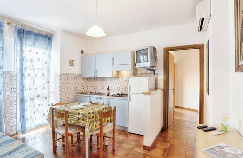 Marina di Cecina Apartment | Cozy Apartment for 4 with Pool, Patio, and Pet-Friendly Perks