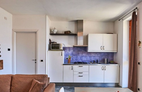 Naggio Apartment | Lovely apartment for 4 people with WIFI, TV, terrace, pets allowed and parking