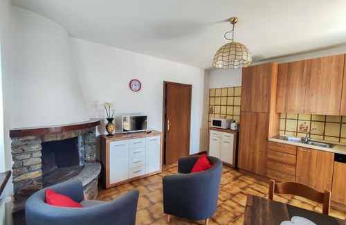Dongo Apartment | Cozy Apartment for Two with Pool, Hot Tub & Lake View
