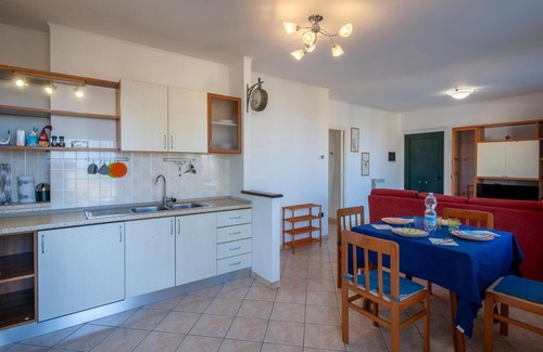 San Costanzo Apartment | Bright Family Apartment with Sea View and Pet-Friendly Amenities