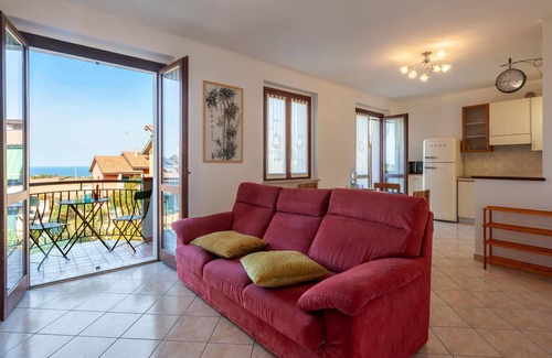 San Costanzo Apartment | Bright Family Apartment with Sea View and Pet-Friendly Amenities