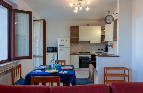 San Costanzo Apartment | Bright Family Apartment with Sea View and Pet-Friendly Amenities