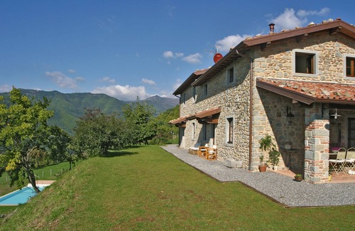 Pieve Fosciana Apartment | Sunny Tuscan Villa with Pool, Spa, and Breathtaking Views