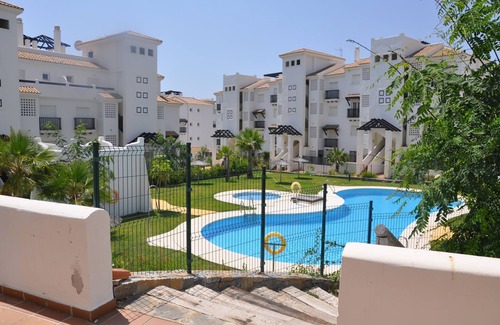 San Luis de Sabinillas Apartment | Inviting Apartment with Pool View & Great Amenities Awaits