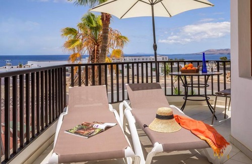 Puerto del Carmen Apartment | Stunning Apartment with Sea and Mountain Views - 10/10 Rated