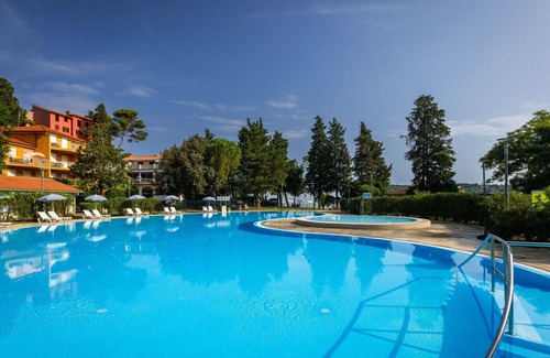 Strunjan Apartment | Inviting Oceanfront Apartment with Pool and Panoramic Views