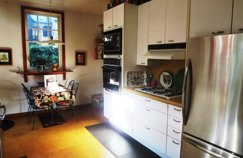 Cabbagetown Apartment | Quaint Arts & Crafts Heritage Home with Garden Oasis