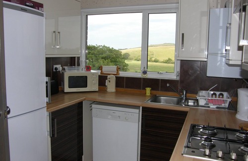 Brading Apartment | Bright Garden Apartment with Spa & Ocean View in Brading
