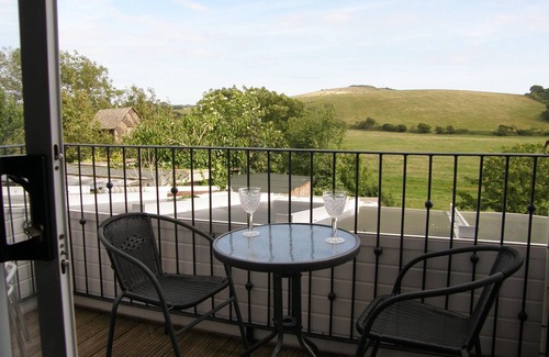 Brading Apartment | Bright Garden Apartment with Spa & Ocean View in Brading