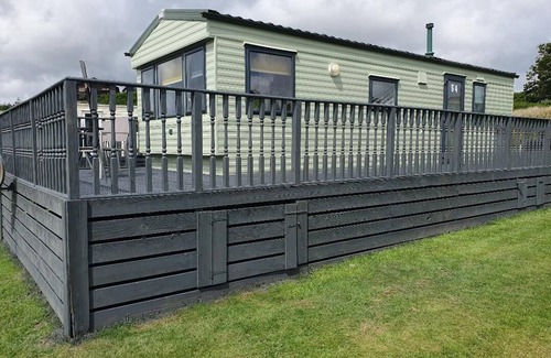 Balminnoch House | Cozy Caravan with Decking at Three Lochs Holiday Park