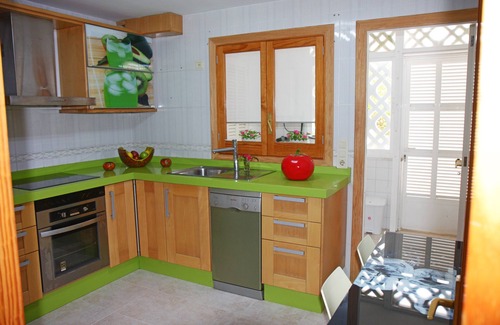 Muro Ski Chalet | Elegant Duplex Steps from Playas de Muro Beach with Ocean View