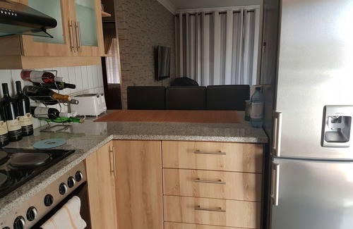 Flamingo Vlei Apartment | Ideal Family Getaway with Oceanfront Views and Pool