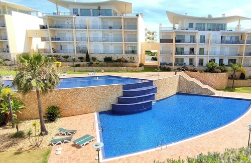 Patio Apartment | Oceanfront Gem Condo with Spa & Pool - Rated 10/10