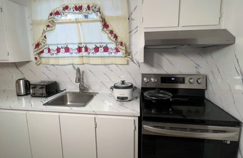 Montreal Apartment | Cozy Half Basement Apartment with Family-Friendly Amenities